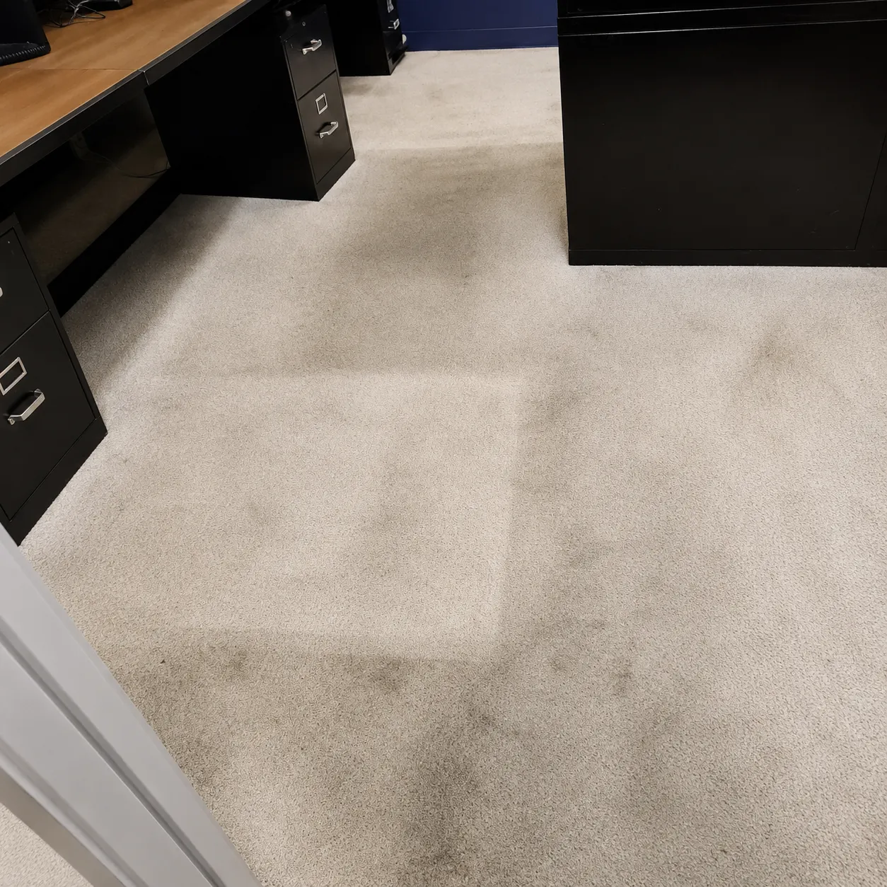 Before carpet cleaning in Richmond showing visible dirt and carpet stains Before carpet cleaning in Richmond showing visible dirt and carpet stains